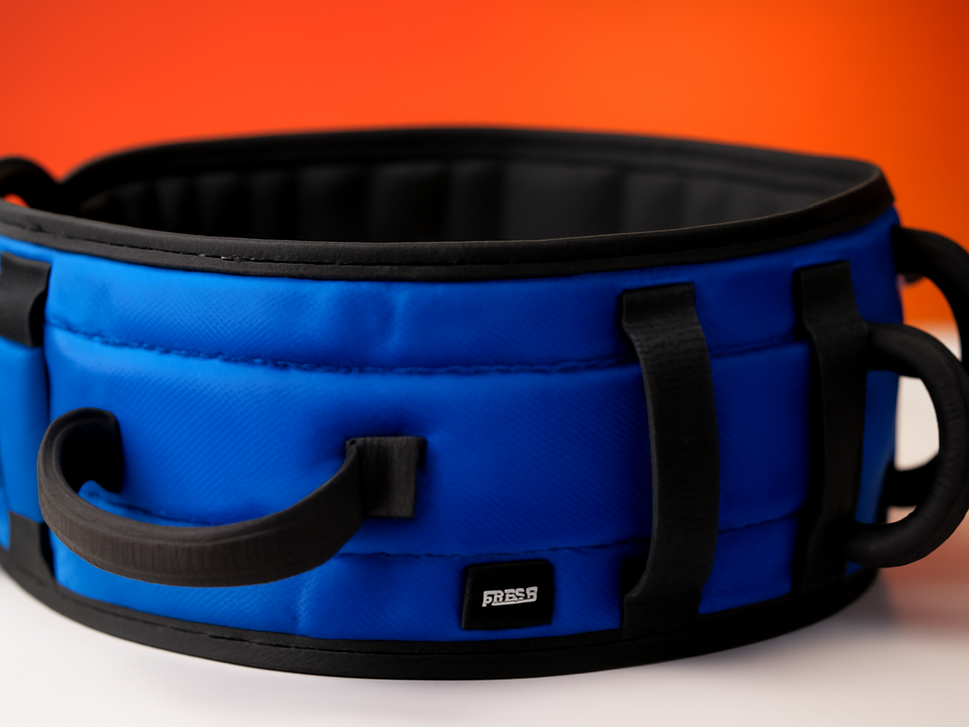 Seven handles of a gait belt arranged in close detail, showing the textured fabric construction
