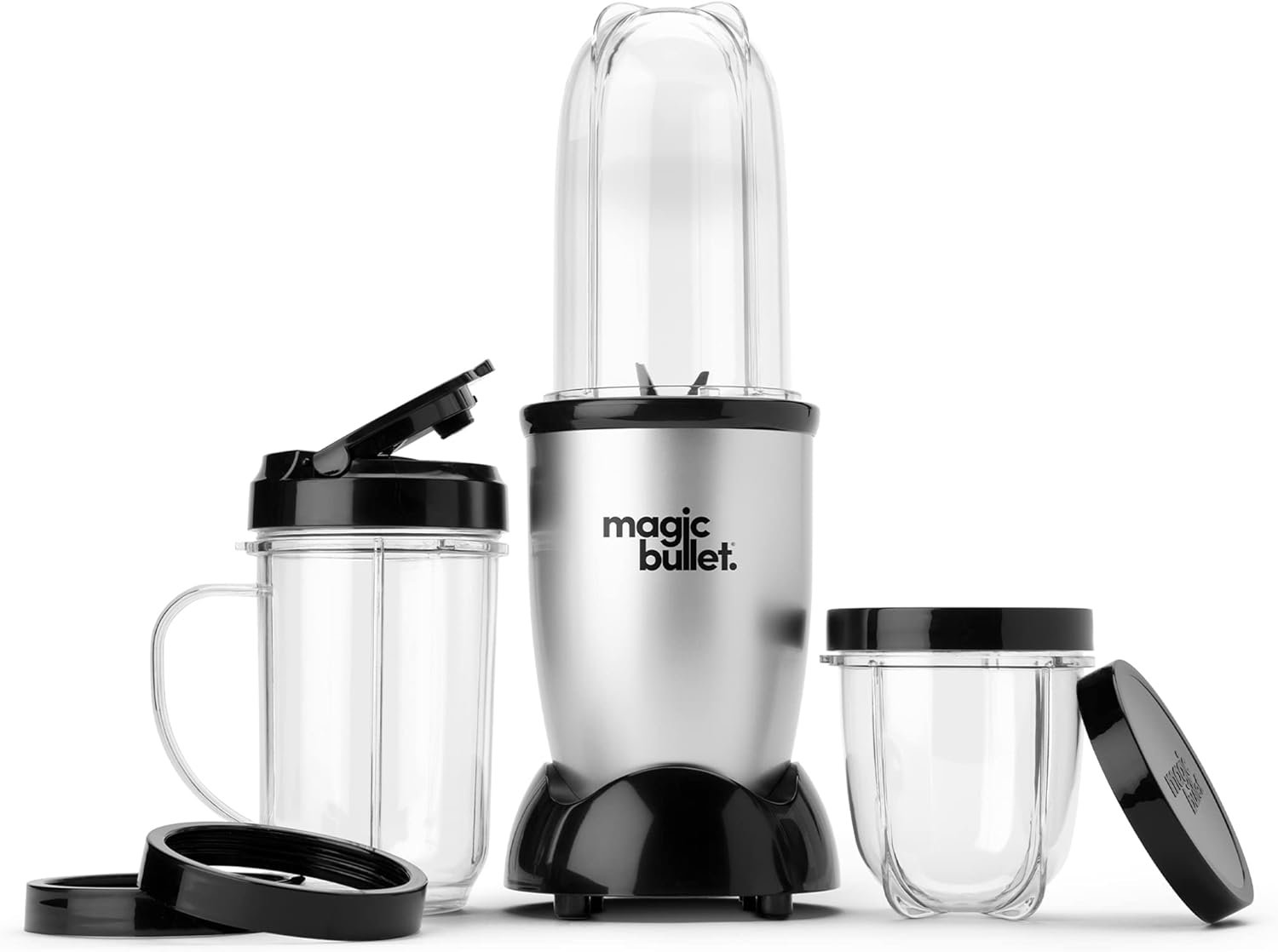 Magic Bullet blender on kitchen counter surrounded by fresh fruit and ingredients for smoothie-making